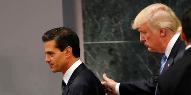 President Enrique Pena Nieto and Donald Trump met in Mexico City but did not agree on who would pay for any border wall. Picture / AP