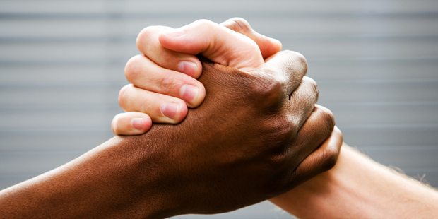 A simple Harvard test looks at whether you find it easier to associate white people with good things or black people with good things. Photo / Getty Images