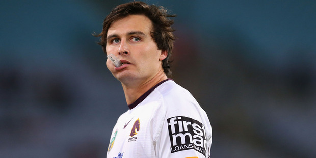Lachlan Maranta watches on during the match between the Rabbitohs and the Broncos. Photo / Getty
