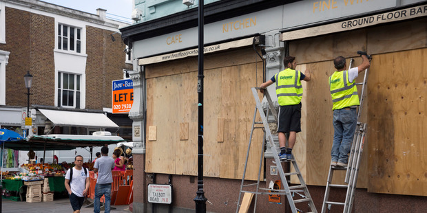 Many shops, homes and business board up ahead of the carnival to prevent damage. Photo / Getty