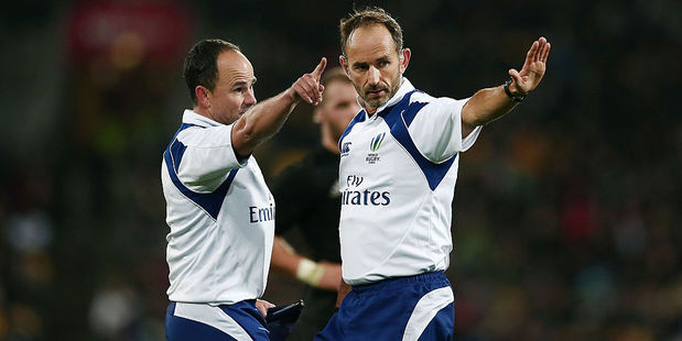 Referees Romain Poite (right) and Jaco Peyper have been criticised by Wallabies coach Michael Chieka. Photo / Getty