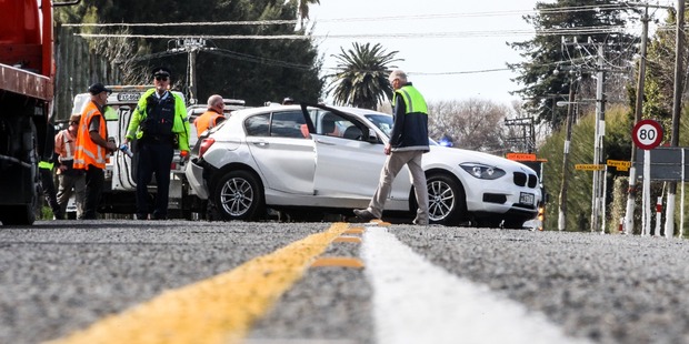 Emergency services at a crash on State Highway 2 today