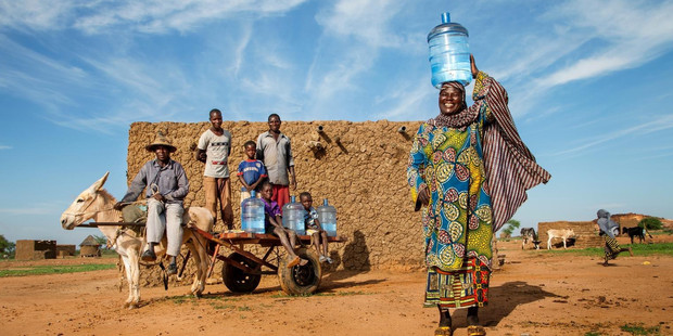 Foure Moussa travels the 2km to the nearest borehole at night to avoid long queues. Photo / Unicef