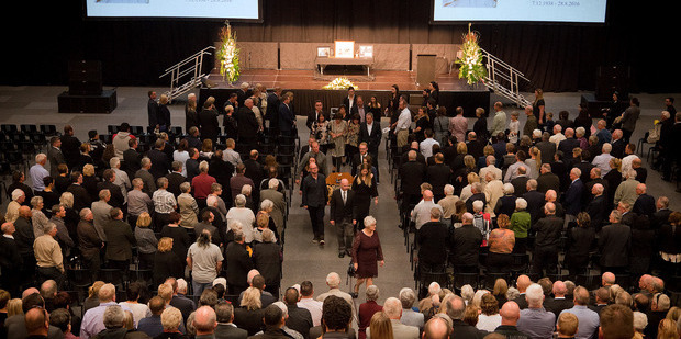 Jim Barker's grandchildren are pallbearers at his funeral, which drew more than a thousand people to celebrate his life.
