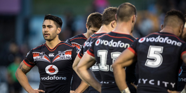 Warriors player Shaun Johnson looks dejected after their loss during round 25 of the NRL Rugby League match between the Warriors and the West Tigers. Photo / Dean Purcell.