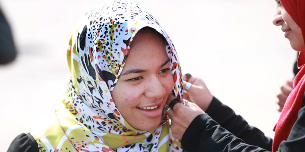 Islam Open Day at Aotea Square Auckland today. Pictured is Ofa Vea from Papatoetoe trying on a Hajib. pHOTO / Doug Sherring