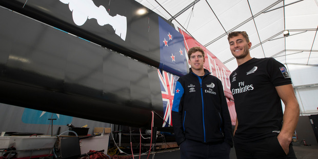 Gold medalists Peter Burling and Blair Tuke back to work at the Team New Zealand base. Photo / Brett Phibbs