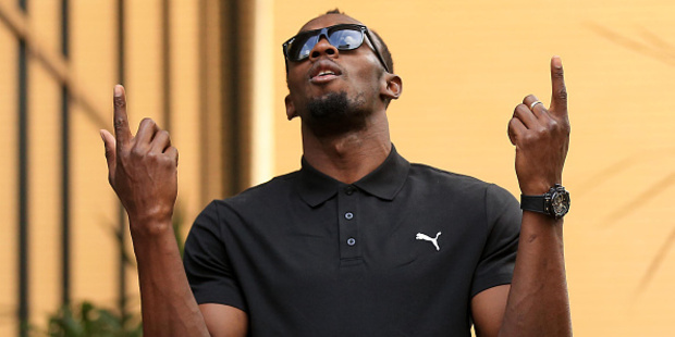 Usain Bolt has reportedly held his own mock Olympic Games medal ceremony in a London hotel room for women who flashed their breasts at him and friends. Photo / AP