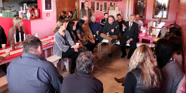 Lawrence Yule, Mayor of Hastings talks to business owners at Pipi Cafe in Havelock North about the recent water contimination. Photo / Paul Taylor