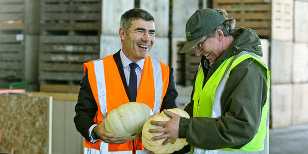Nathan Guy shares a joke with Warren Lowes at Bostock exporters in Hastings. Photo / Warren Buckland