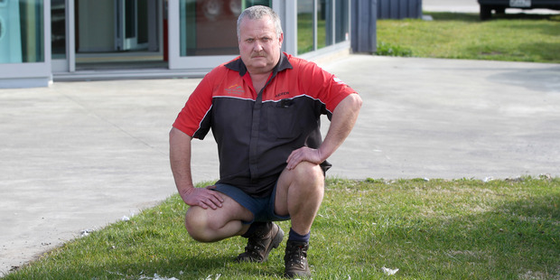 Andrew McDonald, of Peak Mowers, is upset by the waste which had not been cleaned up by the council until Tuesday. Photo / Duncan Brown