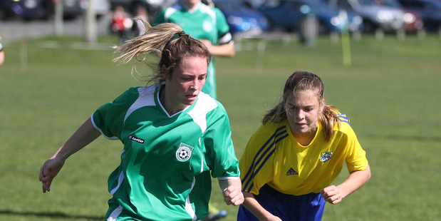 Otumoetai's Nicola Hongston (green) and Ella Fooks from Rotorua Utd - women's football at Fergusson Park Tauranga - Rotorua won 8-0