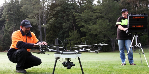 READY FOR TAKEOFF: Operators Kane Fleet, field technician (left), and field scientist Toby Stovold with Scion's latest UAV. PHOTO/SUPPLIED