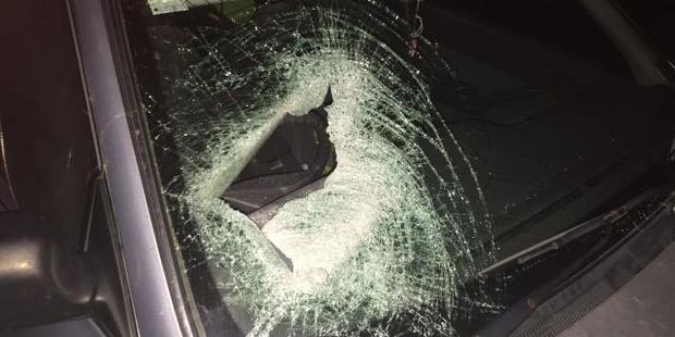 Images show where the bottle hit the car. Photo / NZ Police