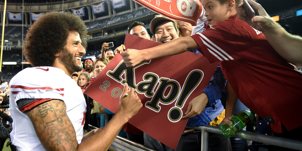 San Francisco 49ers quarterback Colin Kaepernick greets fans after the 49ers' 31-21 win over the San Diego Chargers during an NFL preseason game last week in San Diego. Photo / AP