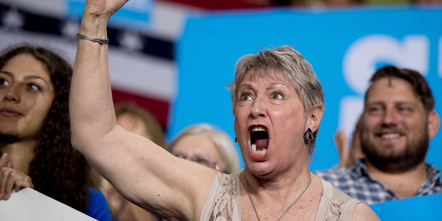 A supporter cheers as Democratic presidential candidate Hillary Clinton speaks at a rally at University of South Florida in Tampa. Photo / AP