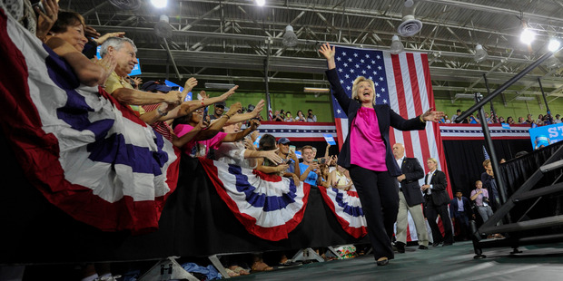 Democratic presidential candidate Hillary Clinton waves to supporters at a rally at the University of South Florida in Tampa. Photo / AP