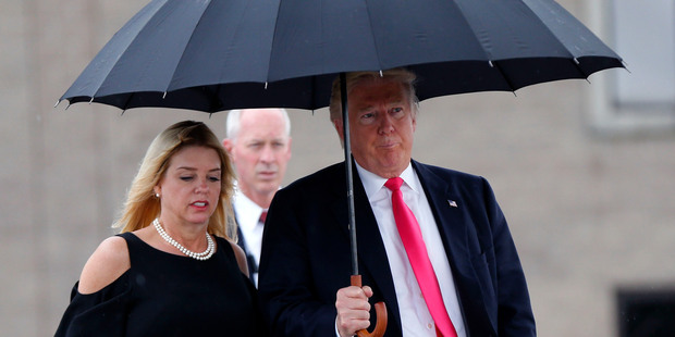 Republican presidential candidate Donald Trump with Florida Attorney-General Pam Bondi, at a campaign rally in Tampa last month. Photo / AP