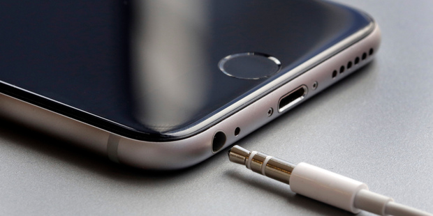 The earphone jack and charging port on an Apple iPhone 6. Apple is preparing to unveil new iPhones tomorrow, with the earphone jack likely to be removed. Photo / AP