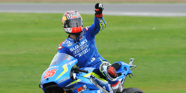 Spain's Maverick Vinales of Suzuki celebrates after winning the Moto GP race at Silverstone. Photo / AP