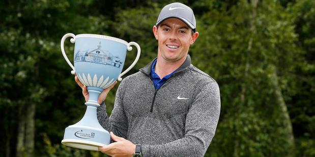 Rory McIlroy holds the trophy after winning the Deutsche Bank Championship. Photo / AP