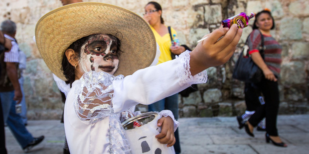 For an authentic Dia de los Muertos experience, plan in advance and work with a local guide. Photo / Getty Images