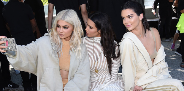 Kylie Jenner, Kim Kardashian, and Kendall Jenner attend the Kanye West Yeezy Season 4 fashion show. Photo / Getty Images