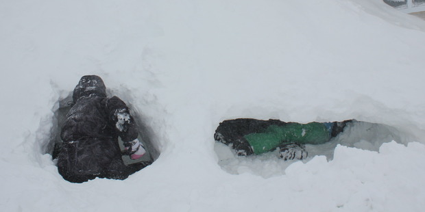 Wellington High School students have fun in the snow. PHOTO/Sue Graham