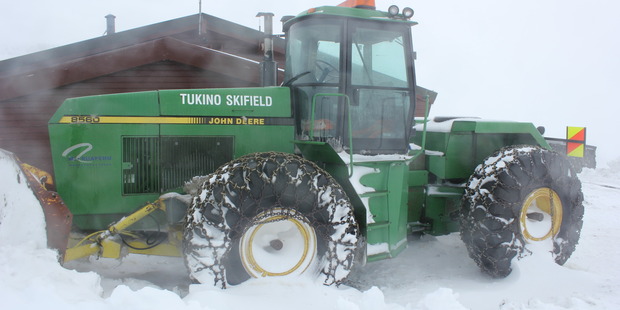 Kermit the tractor will clear the way for the 80 trapped people to get off the mountain once the weather subsides. PHOTO/Sue Graham