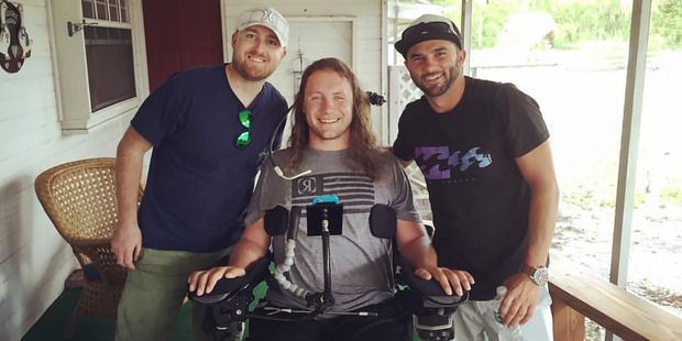 New Zealand wakeboarder Brad Smeele with ICU nurses Paul Barkhau (left) and Andrew Galloway at Lake Ronix in Florida USA. Photo / via Instagram