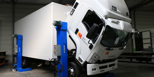 A Waste Management truck being converted to electric in The Netherlands