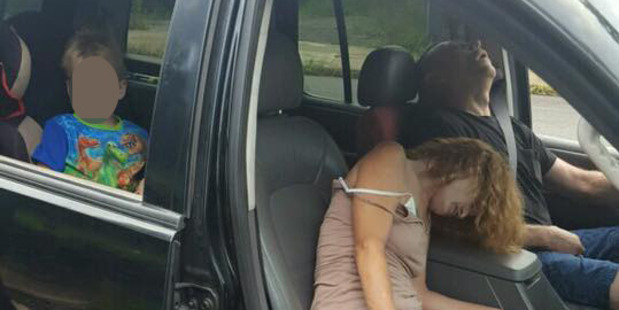 Ohio police have released a graphic photo of a couple overdosing on heroin with a 4-year-old boy in the car. Photo / East Liverpool Police department