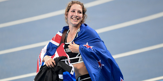 New Zealand's Eliza McCartney celebrates winning bronze at the pole volt. Photo / photosport.nz