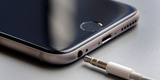 The earphone jack and charging port on an Apple iPhone 6. Photo / AP