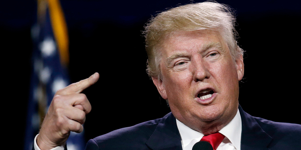Donald Trump's orange face is a shiny beacon of his vanity. But aren't we all a little vain? Photo / AP