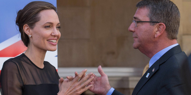 Angelina Jolie with US Defence Secretary Ash Carter at a UN Peacekeeping Defence Ministerial meeting, in London. Photo / AP