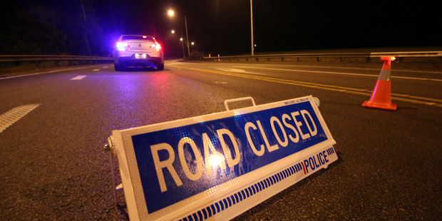 Police say the death of a man whose body was found on SH16, Auckland, last night was not suspicious. Photo / Daniel Hines