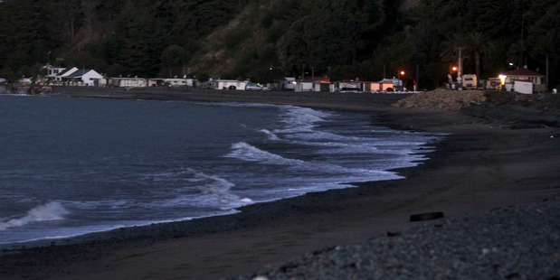Clifton Beach last night where swells are expected to strike the coast today. Photo: Duncan Brown