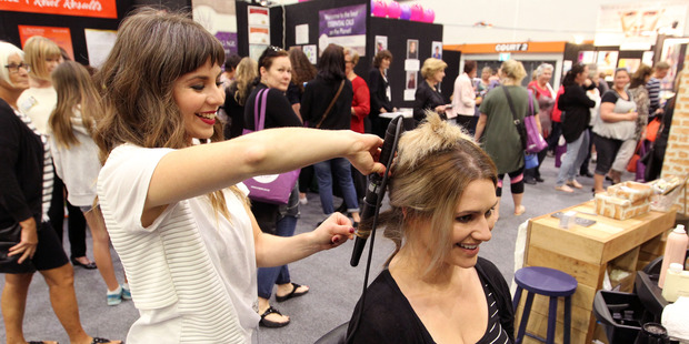 Kathryn Farnworth (left), from The Good Place in Ahuriri, Napier, gives Jessica Clark, from Havelock North, a new look.