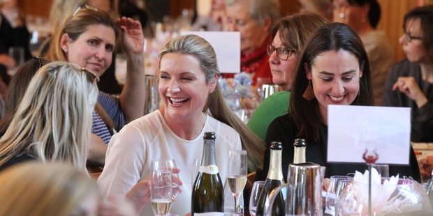 GREAT SUPPORT: Marea Carney (left) and Amelia Riwai, both of Napier, smiling for a good cause at the Business Belles Charity lunch held at the Mission Estate Winery and Restaurant last Friday. PHOTO/DUNCAN BROWN