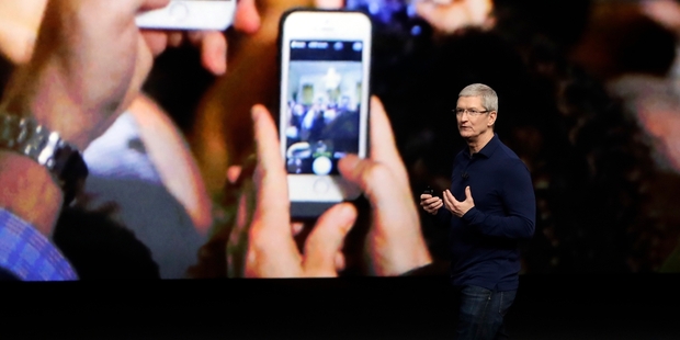 Apple's new phone will accelerate the erosion of the global attention span. Picture / AP