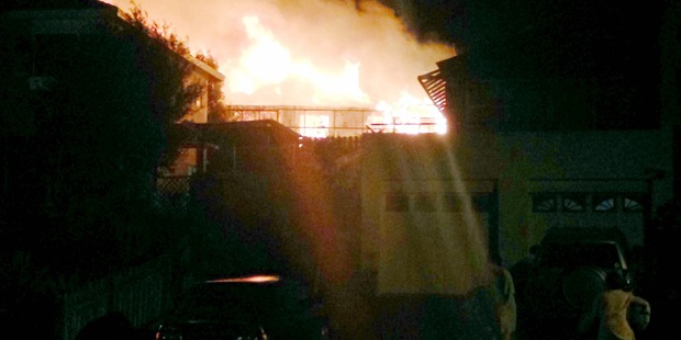 A house is destroyed by fire on Bushland Park Dr, Albany, on the North Shore in the early hours of Thursday morning. Photo / Supplied