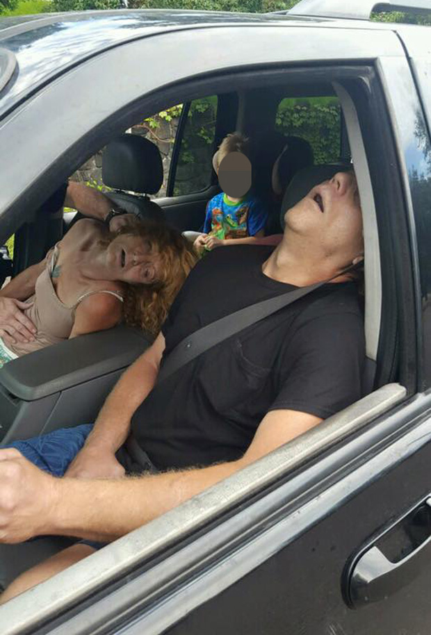 Officials say they decided to make the photos of the unconscious man and woman public to raise awareness of the heroin epidemic in the state. Photo / East Liverpool Police department