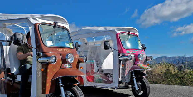 Two of Tuk Tuk NZ's electric tuk tuk - 'The Prez' and 'Lotus'.