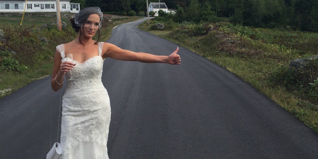 Angelique Arsenault hitchhikes a ride on her wedding. Photo / Angelique Arsenault Facebook