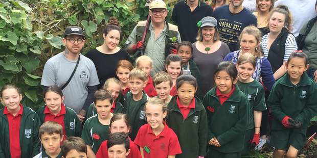 Depot staff with children from Meadowbank School. Photo / Holly Ryan