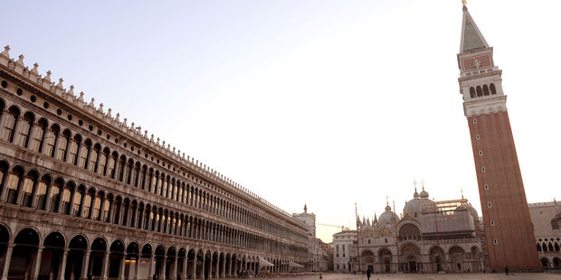 You have to hit St Mark's Square at dawn, if you want a photo like this. Or perform a magic trick. Photo / 123RF