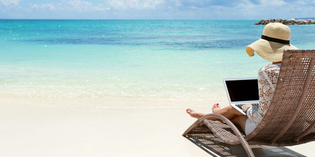 Wish you were here ... The out of office reply message is getting a Qantas makeover. Photo / 123RF