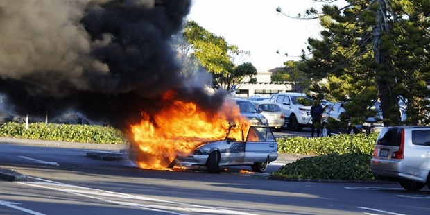 Howick father-of-one Adam Holt managed to escape his burning car with seconds to spare after his Holden Turbo caught fire while he was driving on Sunday evening. Photo/ Henry Yee