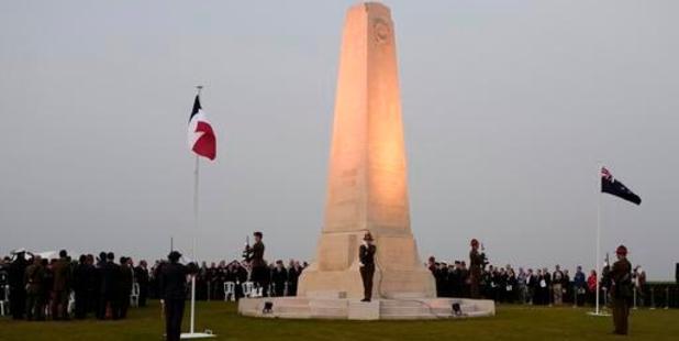 People stand during a ceremony to commemorate the 100th anniversary of the Battle of the Somme. Photo / AP